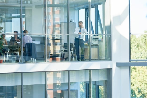 A modern office building with large glass windows, showcasing a collaborative workspace inside. The image should represent the trend of flexible and adaptable office spaces that cater to the needs of modern businesses.