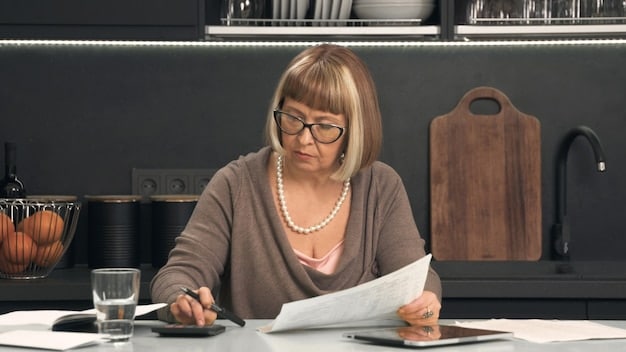 A business owner sitting at a desk, carefully reviewing a document outlining the eligibility criteria for a government grant, with a calculator and financial papers nearby.