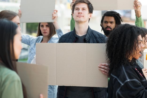 A group of protesters holding signs and chanting slogans, demonstrating against the new immigration policies outside a government building.