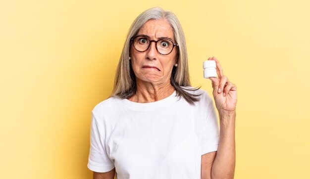 An elderly woman looking concerned while holding a prescription bottle, symbolizing the challenges faced by seniors regarding prescription drug costs and access to medication. The scene is set in a pharmacy.