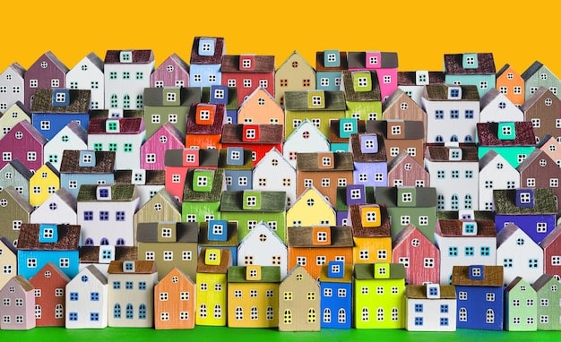 A collage featuring different housing types, including single-family homes, townhouses, and apartment buildings, set against a backdrop of city skylines and green spaces. The image is designed to illustrate the diversity of housing options that could result from zoning reforms.