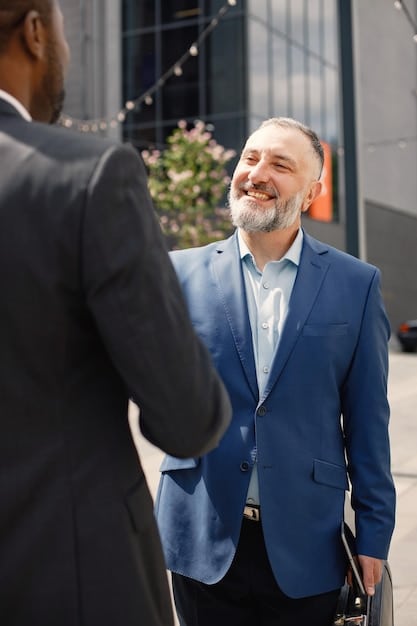 A close-up shot of a business owner shaking hands with a local politician at a small business grand opening. The image conveys a sense of partnership and support for local businesses, emphasizing the positive relationship between government and entrepreneurship. “Federal Tax Credits in Action” is subtly overlaid.
