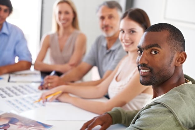 A group of diverse individuals participating in a job training program. The setting is a modern classroom with computers and training materials. The image illustrates how communities benefit from initiatives aimed at fostering local Understanding the Federal Government's Role in Local Economic Development, empowering people for economic growth.