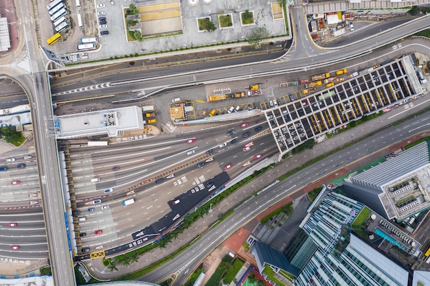 An aerial shot of a bus rapid transit (BRT) system in a bustling city, highlighting dedicated bus lanes, modern bus stops, and efficient traffic flow. The image showcases how federal investments in public transit can improve urban mobility, reduce congestion, and promote sustainable transportation options. The focus is on the efficiency and modernization elements of The Future of Local Transportation.