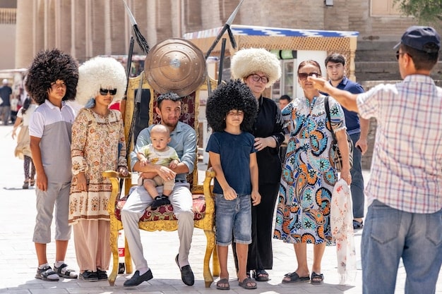 A group of diverse people participating in a community event, such as a cultural festival or a neighborhood cleanup. The image represents positive community relations and social integration. The Impact of Federal Immigration Policies on Local Communities: A 2025 Update comes to life in the unity of the participants.