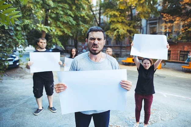 A group of people holding picket signs expressing concerns about political dark money and campaign finance reform, visible in a city park setting.