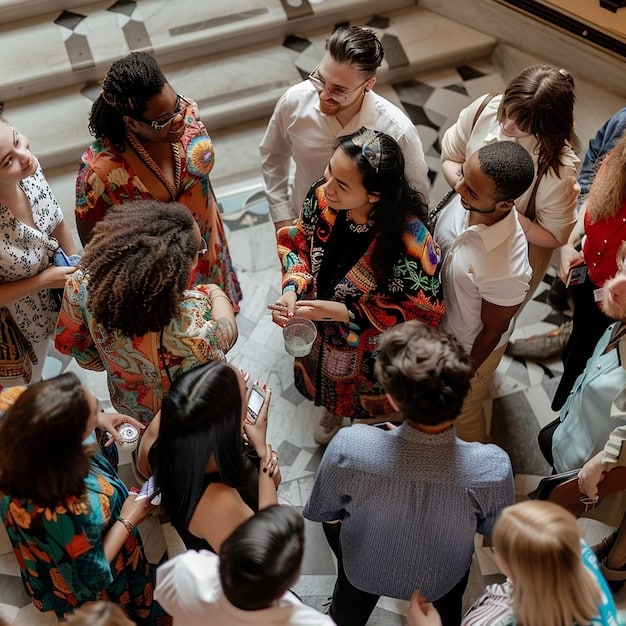 A diverse group of community members interacting at an event, with organizers actively engaging with attendees, capturing the essence of community engagement and Maximize Your Community Event's Reach: Understanding the Updated Social Media Promotion Guidelines for Federal Funding.