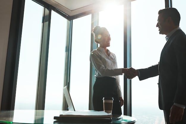 A close-up shot of two business professionals shaking hands firmly, with a modern, well-lit conference hall in the background, symbolizing successful networking.